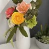 Crepe paper flower arrangement with roses, ranunculus and hydrangea